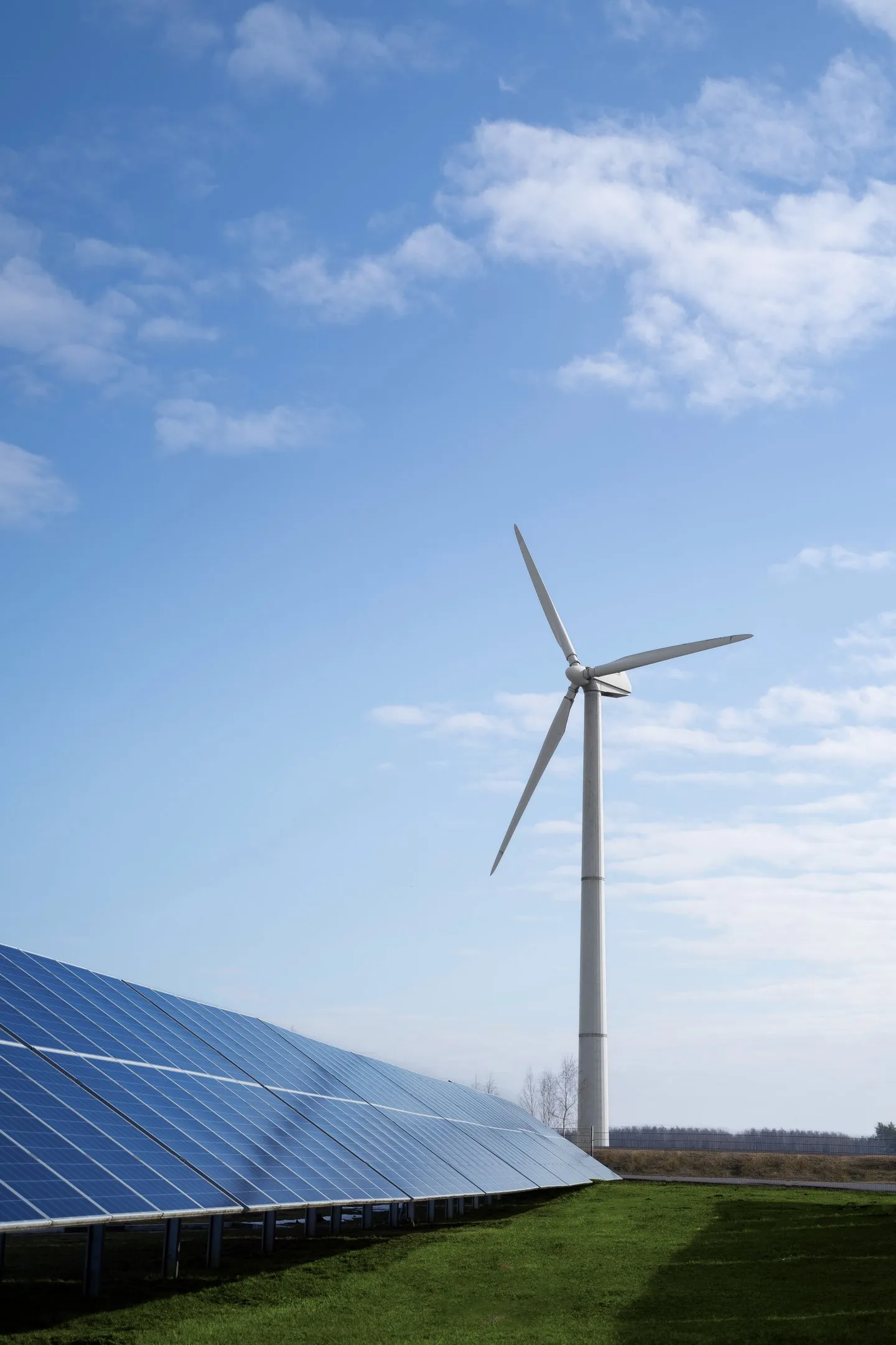 Wind turbines and solar panels at a renewable-energy site